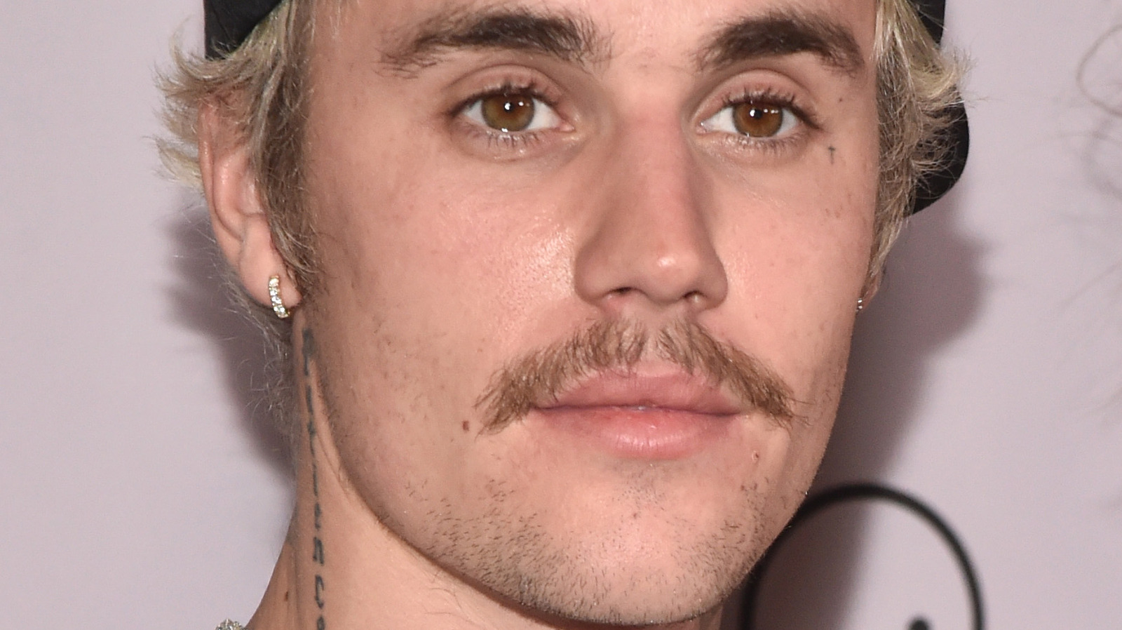 Justin Bieber S Mom Has A Surprising Reaction To His New Peach Tattoo