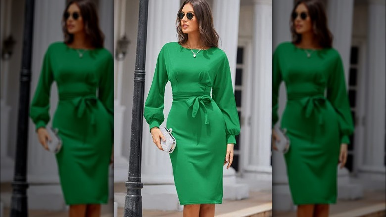 Brunette woman wearing bright green dress