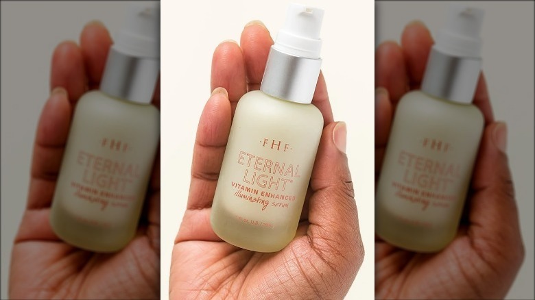 Hand displaying FarmHouse Fresh Eternal Light Serum