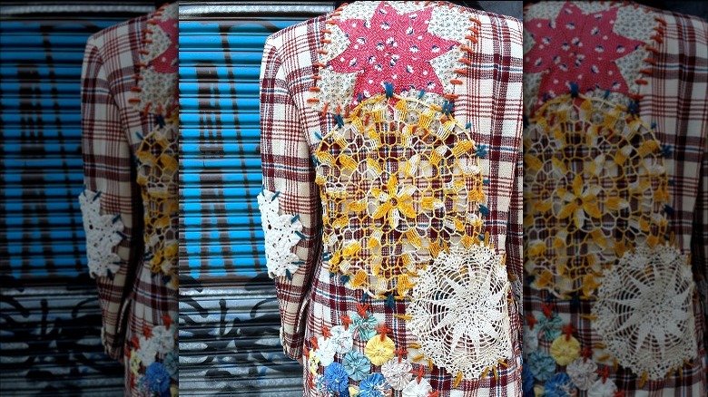 Upcycled jacket with colorful doily patches