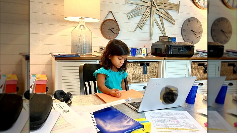 Zoey doing schoolwork at home during the pandemic