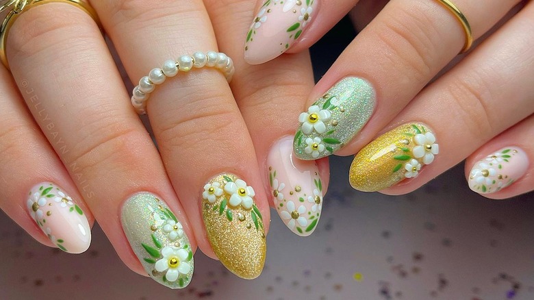 Green and gold nails with 3d flowers