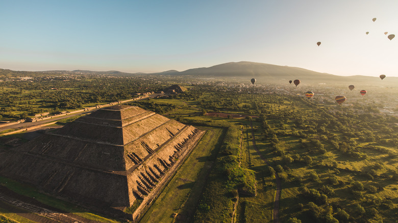 Hot air balloons over pyramids at Teotihuacan, Mexico