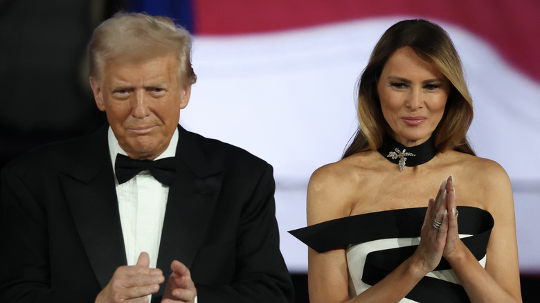 Donald Trump and Melania Trump clapping at the Liberty Inaugural Ball in 2025