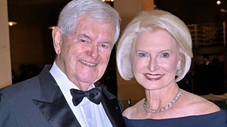 Newt and Calista Gingrich smiling at the camera