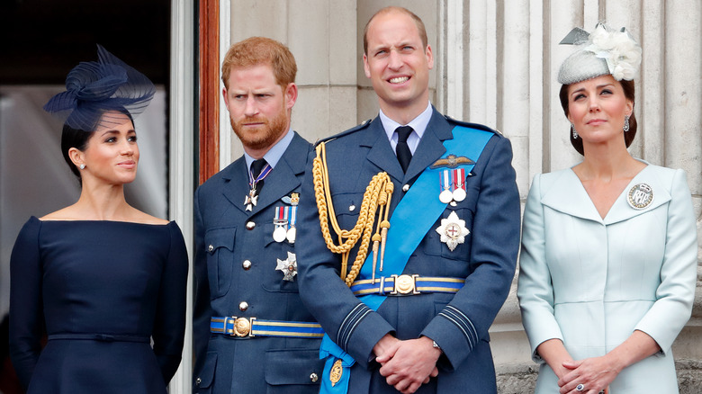 Meghan Markle, Prince Harry, Prince William, and Princess Catherine on balcony