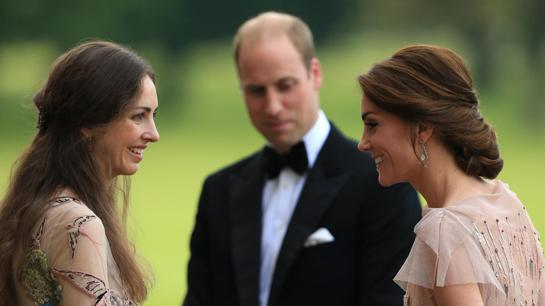 Rose Hanbury greeting Princess Catherine with Prince William in the background