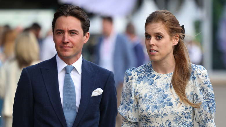 Edoardo Mapelli Mozzi and Princess Beatrice walking together outside