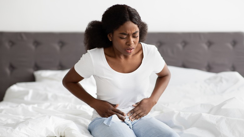 Black woman with a stomachache 