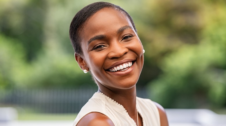 Confident woman smiling 