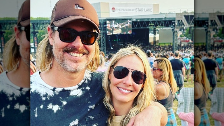 Steve Ford with wife at outdoor concert