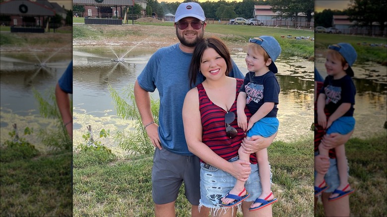 Amy King smiling with son Daxton King  and husband Dillon King