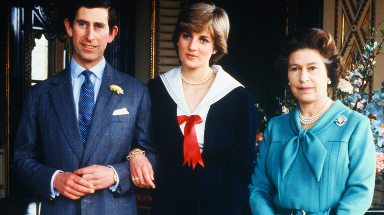 Charles offers Diana his arm