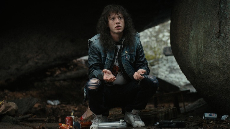 Eddie showing off his ripped jeans in an episode of "Stranger Things"