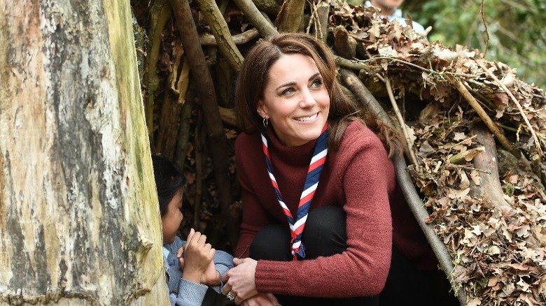 Kate Middleton and child in woods