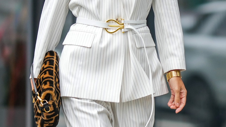 Woman wearing pinstripe suit 