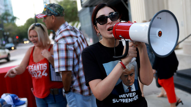 Laura Loomer holding a megaphone