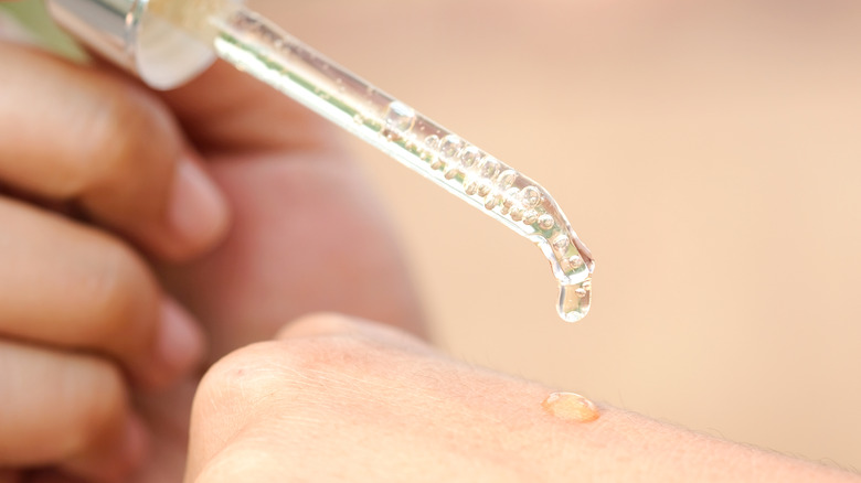 Person applying product on hand