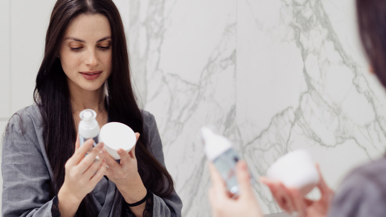 Woman looking at product labels