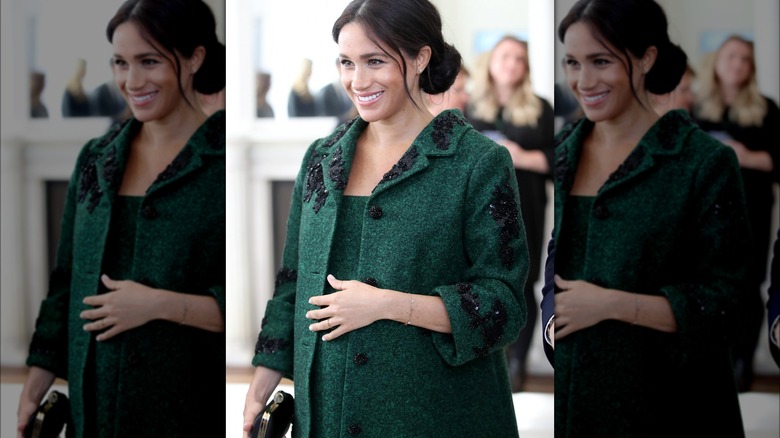 Meghan Markle pregnant in a green dress