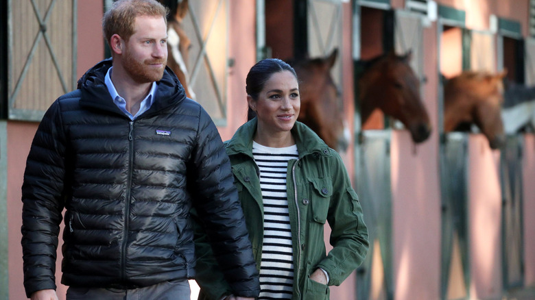 Prince Harry and Meghan Markle walking