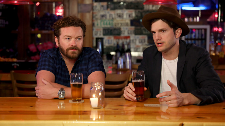 Danny Masterson and Ashton Kutcher drinking beer