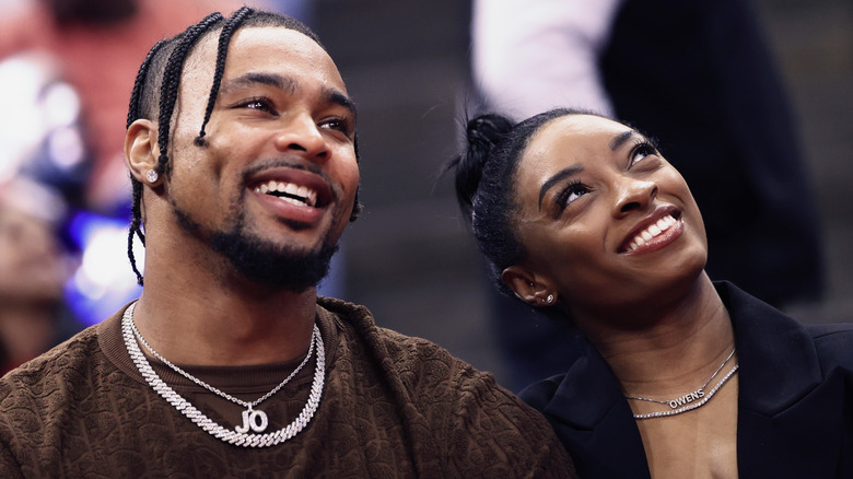 Jonathan Owens and Simone Biles smiling