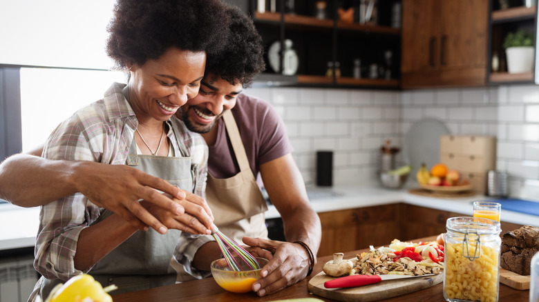 couple cooks together