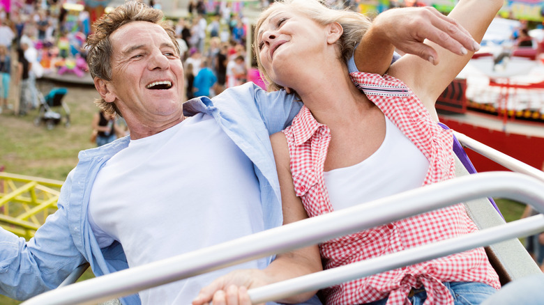 Couple on an amusement ride