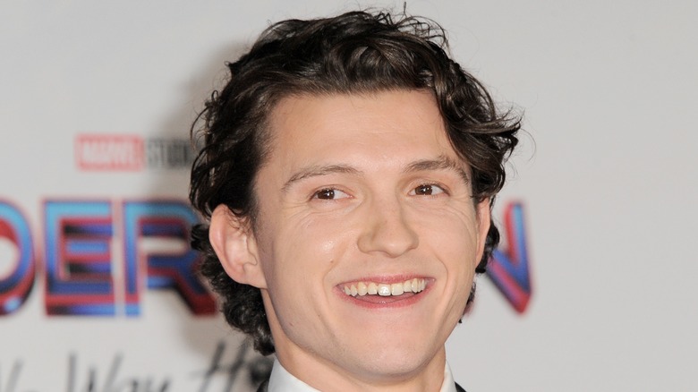 Tom Holland attending an event