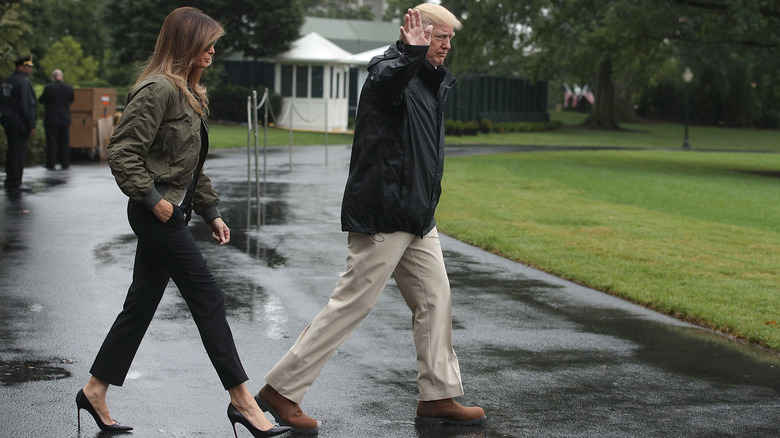 Melania Trump and Donald Trump walking