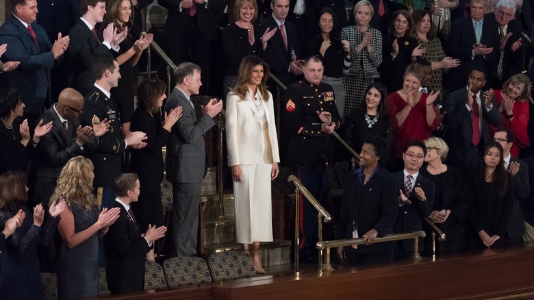 Melania Trump in a white outfit