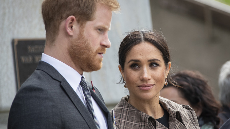 Meghan Markle looking at Prince Harry