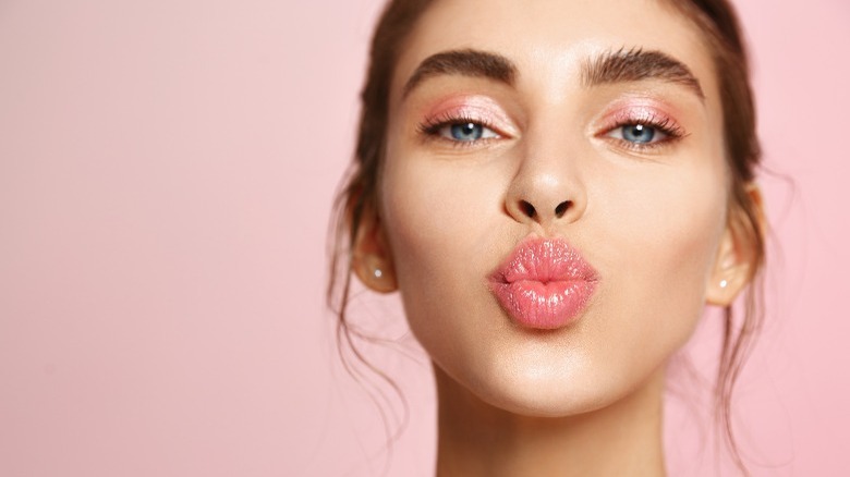 Woman in pink makeup