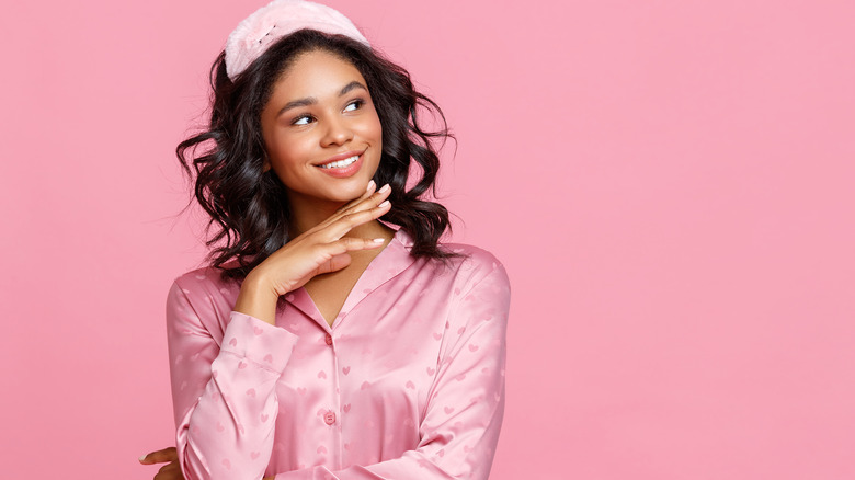 Woman in pink pajama set 