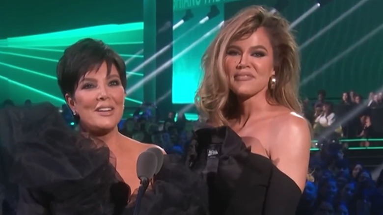 Kris Jenner and Khloe Kardashian on stage at the People's Choice Awards in 2022