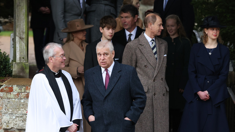 Prince Andrew talking to reverend outside church