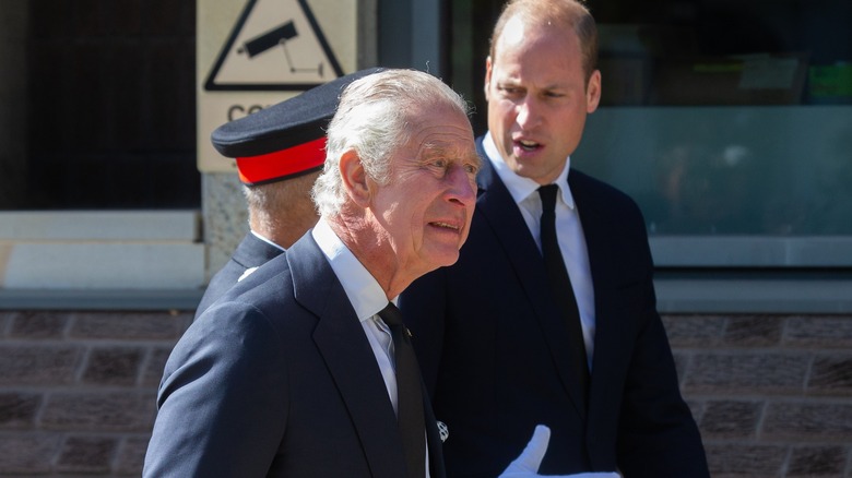 Prince William and Charles walking 