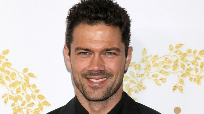 Ryan Paevey smiling