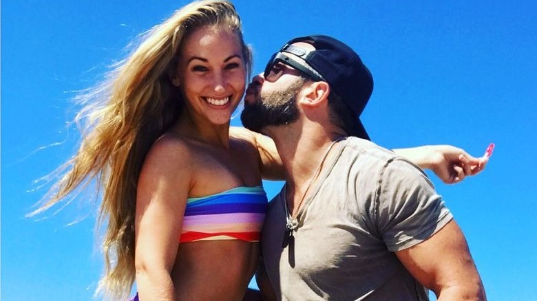 Britni and Brad smiling on the beach