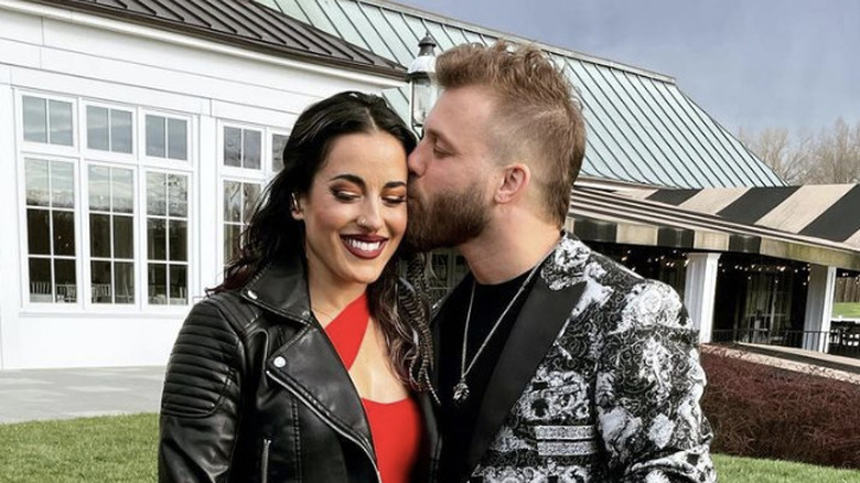 Cara Maria and Paulie Calafiore kiss