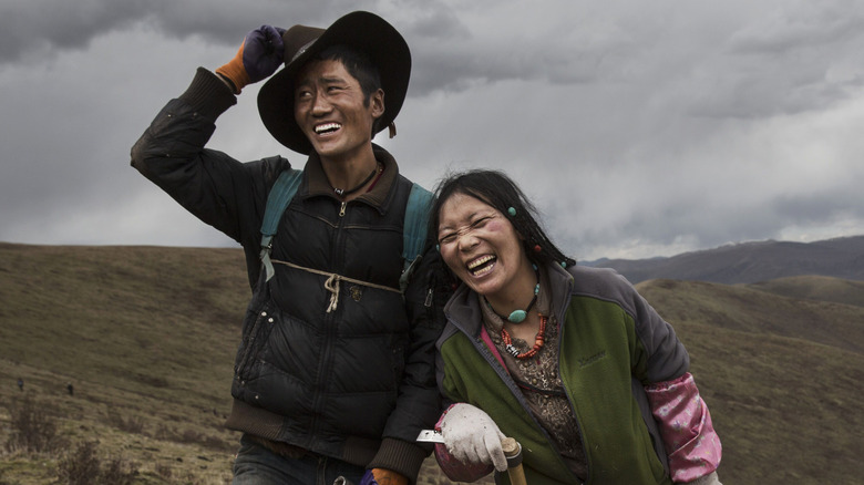 Man and woman laughing