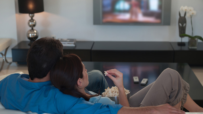 Man and woman watching TV