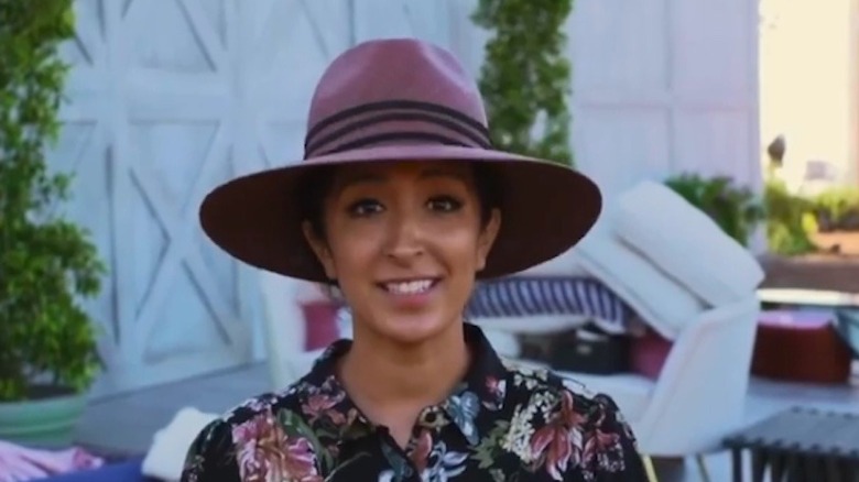 Veronica Valencia Hughes in purple hat