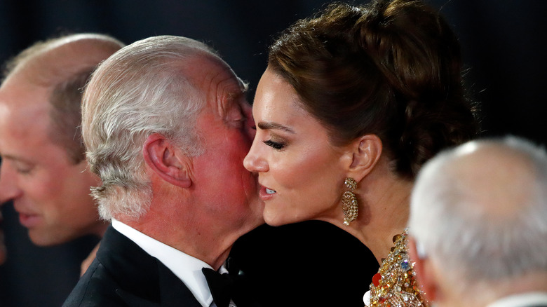 Charles and Kate kiss on cheek 