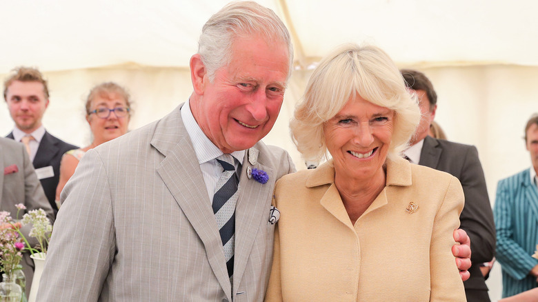 Charles hugging Camilla 