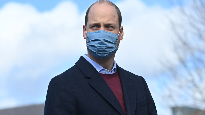 Prince William wearing a mask