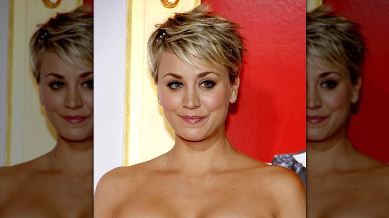 Kaley Cuoco smiling at the Chinese Theater in 2015 with her pixie cut