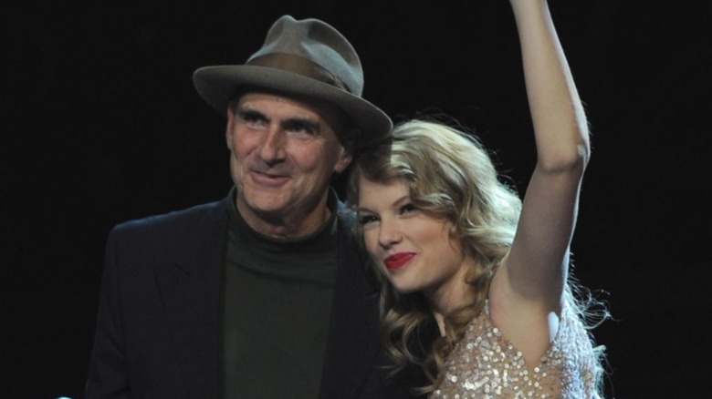 Taylor Swift and James Taylor smiling