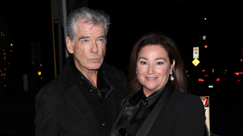 Pierce Brosnan and Keely Shaye Smith in all-black outfits in 2024